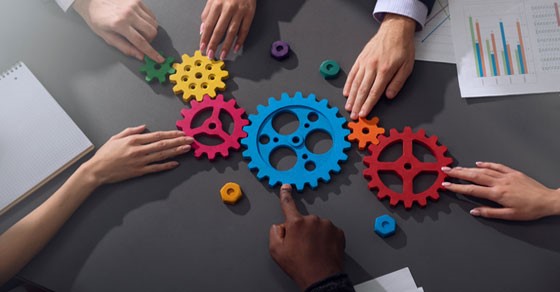 Business team with gears - working together