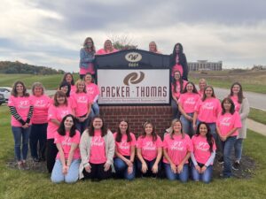 Packer Thomas Team Wearing Pink- Best Firm for Women